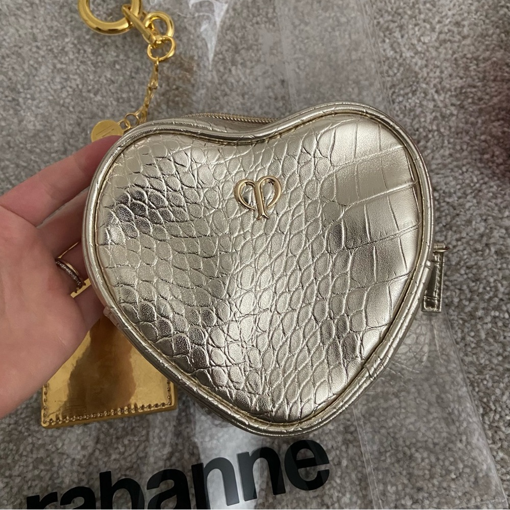5 items - Rabanne Transparent Tote with Gold Heart Pouch, lotion and more! ⭐️ - Picture 8 of 12